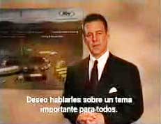 Frameshot of a man with subtitles on screen